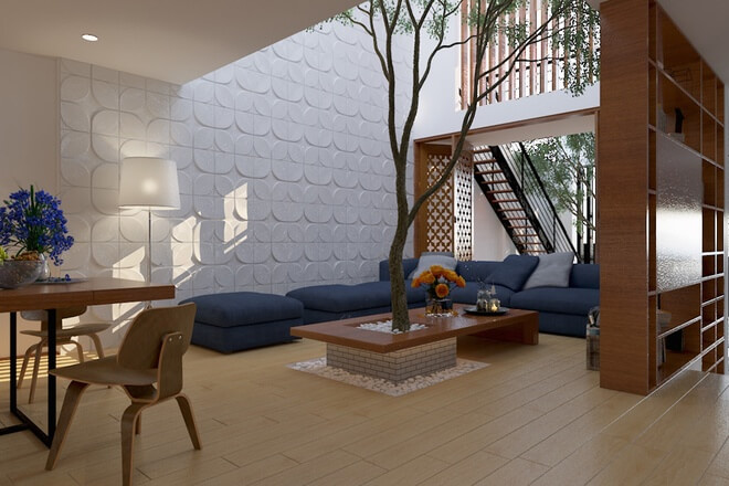 Thiết kế nhà với một phần không gian nhỏ phía trước được lấy làm khoảng thông tầng giúp các phòng có đủ ánh sáng với cây xanh 