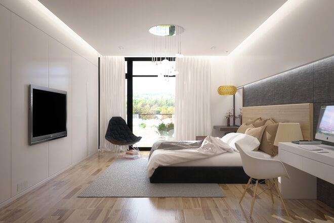Phòng ngủ trong mẫu thiết kế nhà đẹp, trên tầng 3, phòng bố mẹ và con. Phòng ngủ của bố mẹ có khung cửa kính lớn nhìn ra sân vườn và cổng