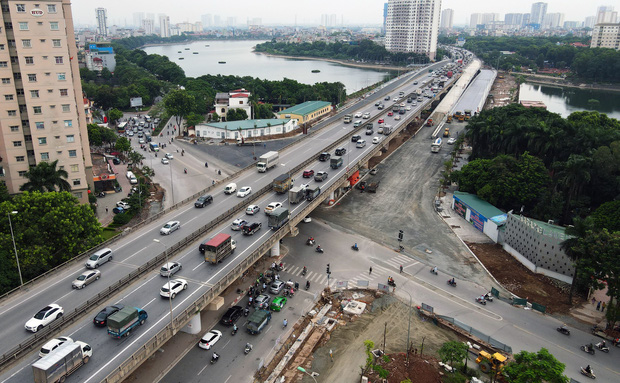 Cận cảnh tuyến đường vành đai 3 đi thấp qua hồ Linh Đàm đang trong quá trình hoàn thiện - Ảnh 11. Cận cảnh tuyến đường vành đai 3 đi thấp qua hồ Linh Đàm đang trong quá trình hoàn thiện - Ảnh 11.