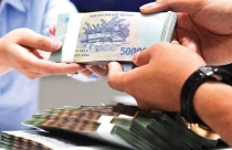 Lãi suất tiết kiệm giảm nhưng lãi vay “dậm chân tại chỗ”